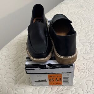 DV by Dolce Vita Black Leather Slip-On Loafers with Tan Platform Sole